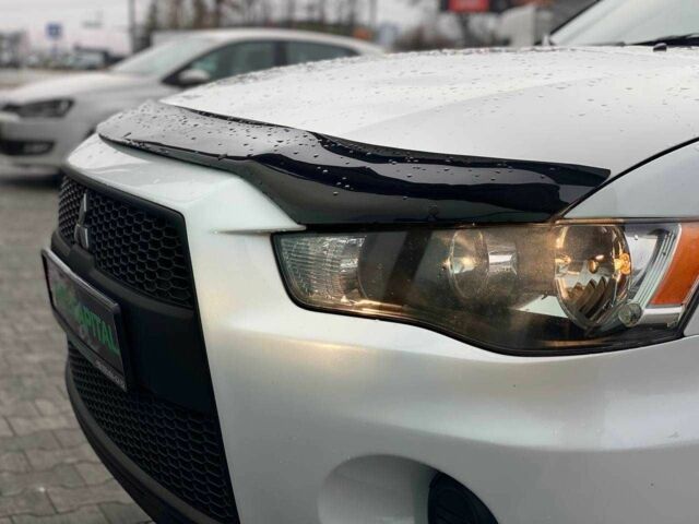 Белый Мицубиси Аутлендер, объемом двигателя 2 л и пробегом 248 тыс. км за 10490 $, фото 10 на Automoto.ua