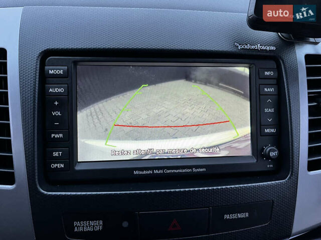 Белый Мицубиси Аутлендер, объемом двигателя 2.3 л и пробегом 161 тыс. км за 11150 $, фото 39 на Automoto.ua