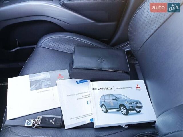 Білий Міцубісі Аутлендер, об'ємом двигуна 2.36 л та пробігом 168 тис. км за 12300 $, фото 37 на Automoto.ua