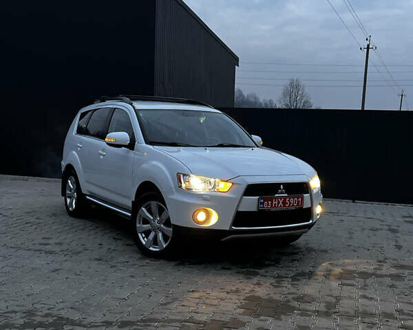 Белый Мицубиси Аутлендер, объемом двигателя 2.3 л и пробегом 161 тыс. км за 11150 $, фото 53 на Automoto.ua