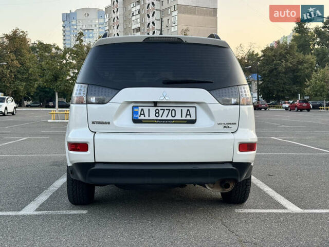 Білий Міцубісі Аутлендер, об'ємом двигуна 2 л та пробігом 187 тис. км за 12200 $, фото 4 на Automoto.ua