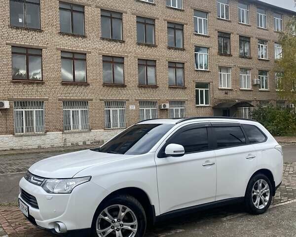 Белый Мицубиси Аутлендер, объемом двигателя 2.36 л и пробегом 152 тыс. км за 11500 $, фото 13 на Automoto.ua