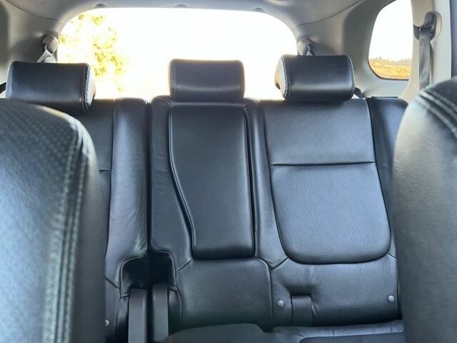 Білий Міцубісі Аутлендер, об'ємом двигуна 2.3 л та пробігом 215 тис. км за 12800 $, фото 20 на Automoto.ua