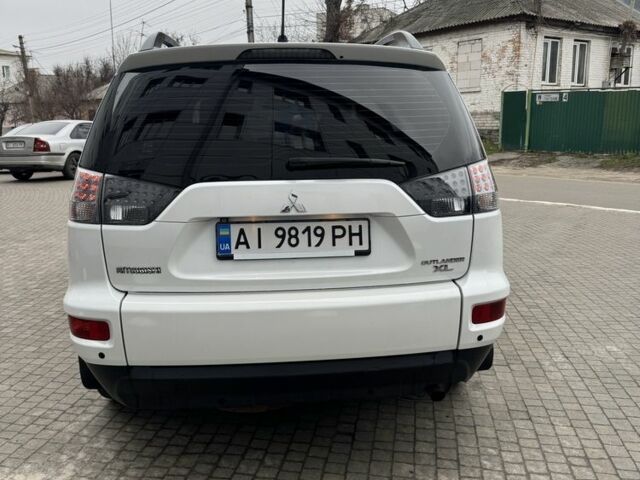 Білий Міцубісі Аутлендер, об'ємом двигуна 2.4 л та пробігом 174 тис. км за 12500 $, фото 3 на Automoto.ua