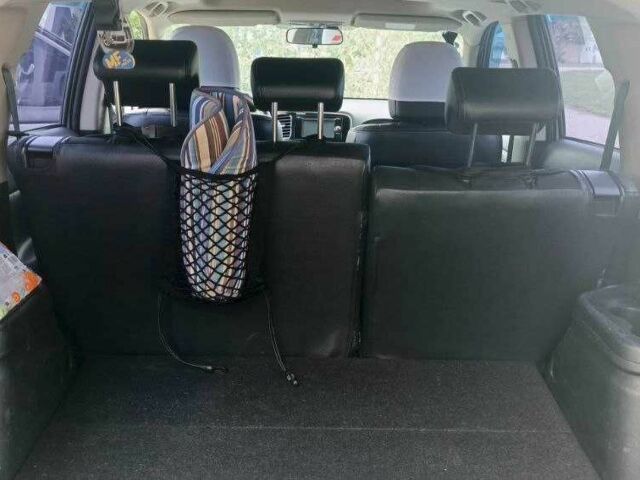 Білий Міцубісі Аутлендер, об'ємом двигуна 2.4 л та пробігом 300 тис. км за 12500 $, фото 6 на Automoto.ua