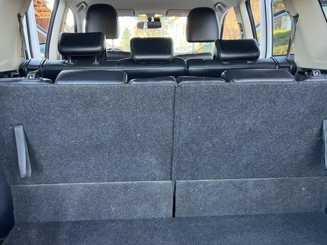 Білий Міцубісі Аутлендер, об'ємом двигуна 2.3 л та пробігом 215 тис. км за 12800 $, фото 23 на Automoto.ua