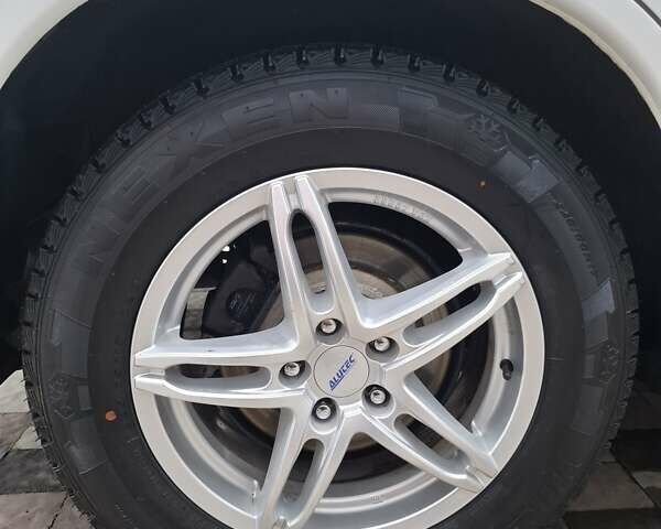 Белый Мицубиси Аутлендер, объемом двигателя 2.3 л и пробегом 247 тыс. км за 14100 $, фото 7 на Automoto.ua