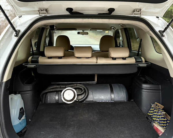 Білий Міцубісі Аутлендер, об'ємом двигуна 2 л та пробігом 150 тис. км за 11000 $, фото 12 на Automoto.ua