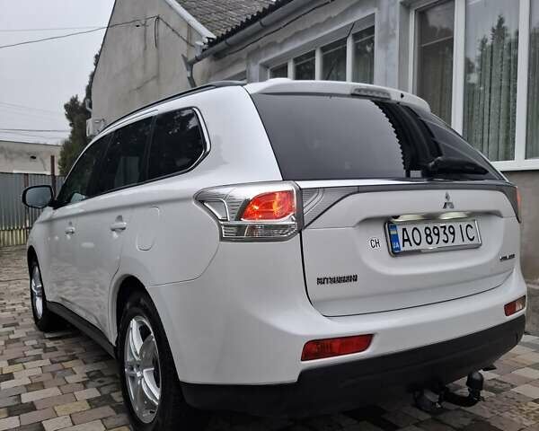 Белый Мицубиси Аутлендер, объемом двигателя 2.3 л и пробегом 247 тыс. км за 14100 $, фото 11 на Automoto.ua