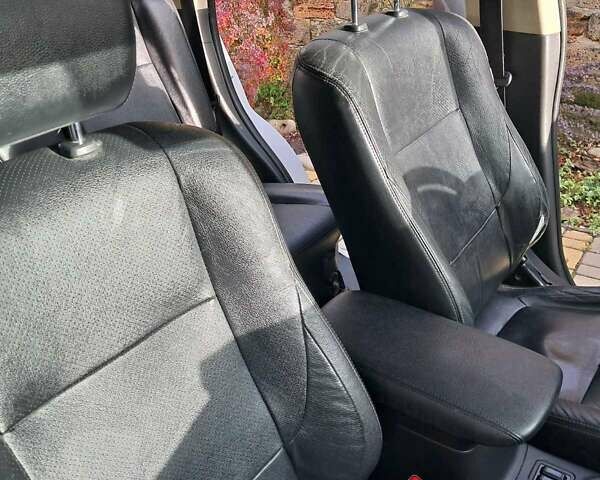 Белый Мицубиси Аутлендер, объемом двигателя 2.36 л и пробегом 240 тыс. км за 11800 $, фото 9 на Automoto.ua