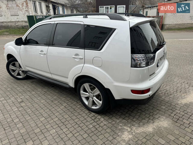 Белый Мицубиси Аутлендер, объемом двигателя 2.4 л и пробегом 180 тыс. км за 12500 $, фото 2 на Automoto.ua