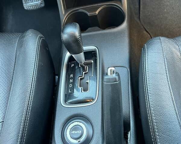 Білий Міцубісі Аутлендер, об'ємом двигуна 2.27 л та пробігом 215 тис. км за 12800 $, фото 14 на Automoto.ua