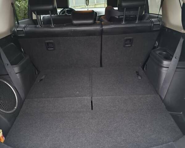 Белый Мицубиси Аутлендер, объемом двигателя 2.3 л и пробегом 247 тыс. км за 14100 $, фото 5 на Automoto.ua