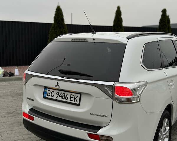 Белый Мицубиси Аутлендер, объемом двигателя 2.2 л и пробегом 262 тыс. км за 12800 $, фото 4 на Automoto.ua