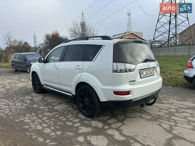 Белый Мицубиси Аутлендер, объемом двигателя 2.2 л и пробегом 226 тыс. км за 10999 $, фото 5 на Automoto.ua