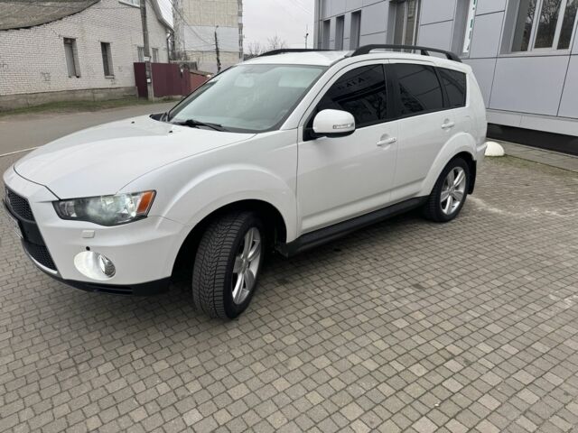 Білий Міцубісі Аутлендер, об'ємом двигуна 2.4 л та пробігом 174 тис. км за 12500 $, фото 1 на Automoto.ua