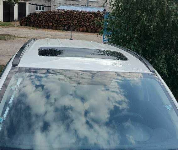 Білий Міцубісі Аутлендер, об'ємом двигуна 2.4 л та пробігом 300 тис. км за 12500 $, фото 9 на Automoto.ua