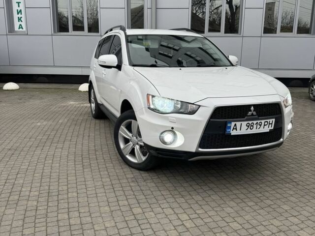 Білий Міцубісі Аутлендер, об'ємом двигуна 2.4 л та пробігом 174 тис. км за 12500 $, фото 5 на Automoto.ua