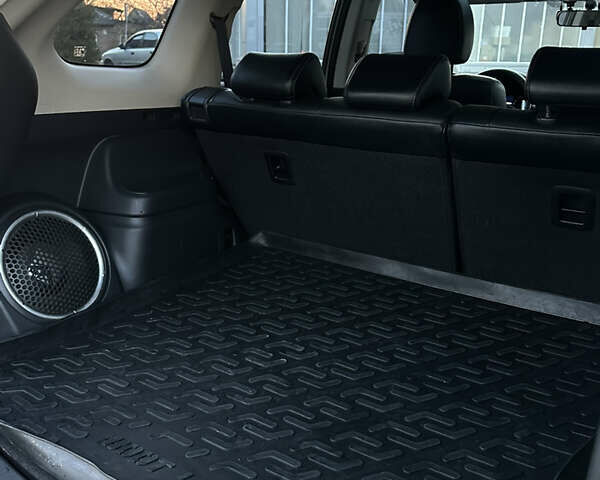 Белый Мицубиси Аутлендер, объемом двигателя 2.36 л и пробегом 76 тыс. км за 15000 $, фото 9 на Automoto.ua