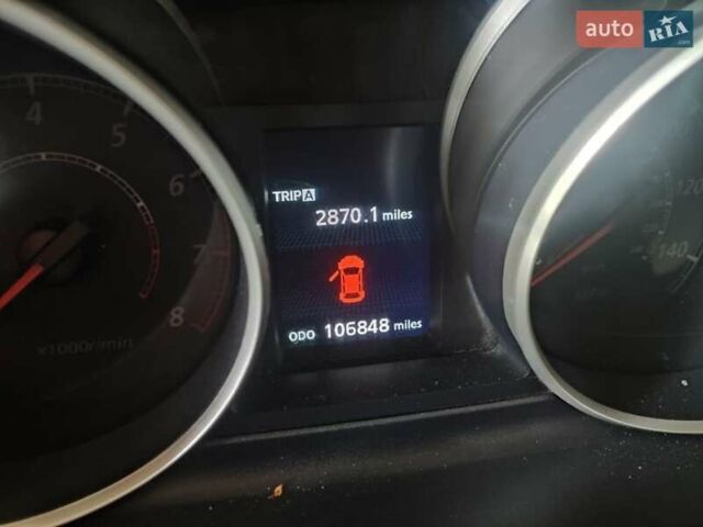 Белый Мицубиси Аутлендер, объемом двигателя 2.36 л и пробегом 113 тыс. км за 12500 $, фото 3 на Automoto.ua