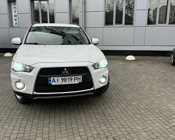 Белый Мицубиси Аутлендер, объемом двигателя 2.4 л и пробегом 180 тыс. км за 12500 $, фото 6 на Automoto.ua