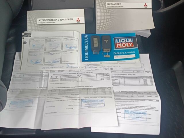 Білий Міцубісі Аутлендер, об'ємом двигуна 2.4 л та пробігом 112 тис. км за 15000 $, фото 10 на Automoto.ua