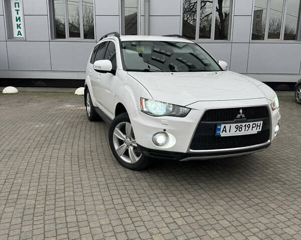 Белый Мицубиси Аутлендер, объемом двигателя 2.4 л и пробегом 180 тыс. км за 12500 $, фото 5 на Automoto.ua