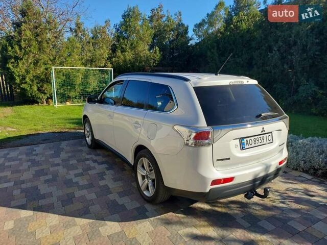 Белый Мицубиси Аутлендер, объемом двигателя 2.3 л и пробегом 247 тыс. км за 14100 $, фото 13 на Automoto.ua