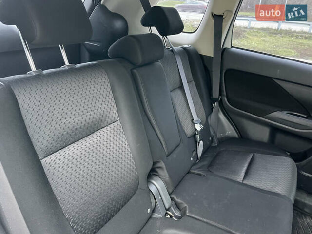 Білий Міцубісі Аутлендер, об'ємом двигуна 2 л та пробігом 194 тис. км за 9200 $, фото 21 на Automoto.ua