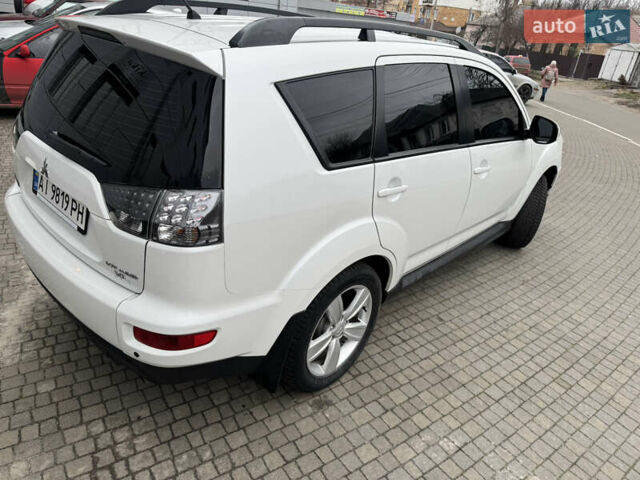 Белый Мицубиси Аутлендер, объемом двигателя 2.4 л и пробегом 180 тыс. км за 12500 $, фото 4 на Automoto.ua