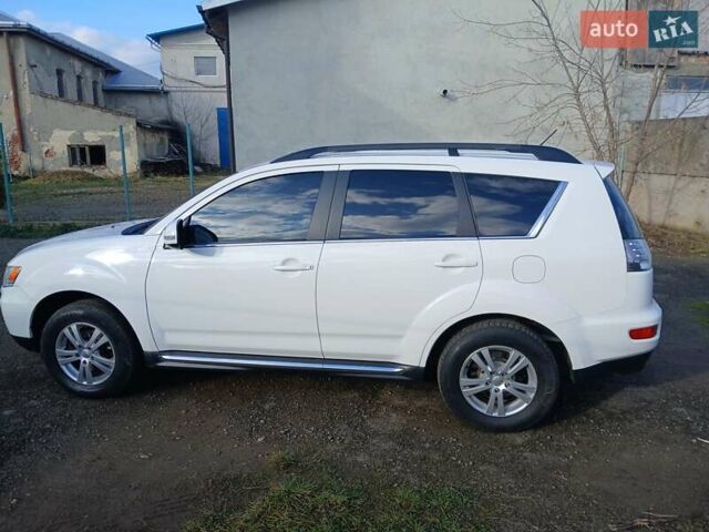 Білий Міцубісі Аутлендер, об'ємом двигуна 2.2 л та пробігом 181 тис. км за 12300 $, фото 11 на Automoto.ua