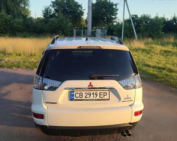 Білий Міцубісі Аутлендер, об'ємом двигуна 2.27 л та пробігом 214 тис. км за 12450 $, фото 2 на Automoto.ua