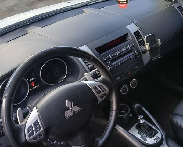 Білий Міцубісі Аутлендер, об'ємом двигуна 2.2 л та пробігом 181 тис. км за 12300 $, фото 38 на Automoto.ua