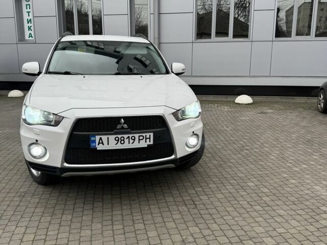 Білий Міцубісі Аутлендер, об'ємом двигуна 2.4 л та пробігом 174 тис. км за 12500 $, фото 6 на Automoto.ua