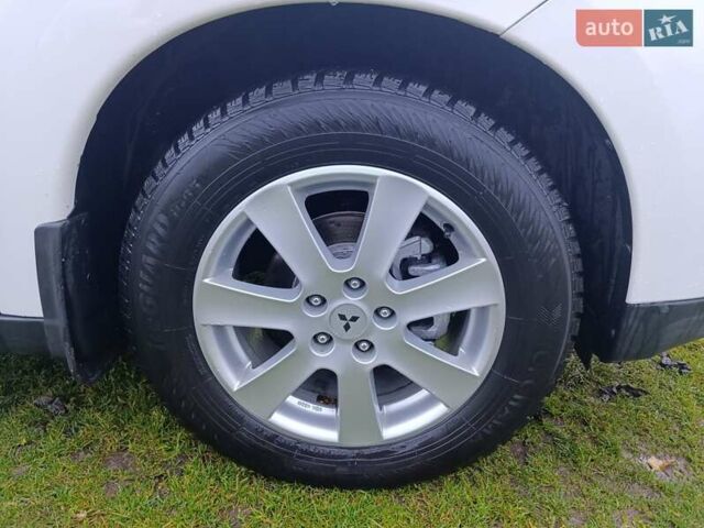 Белый Мицубиси Аутлендер, объемом двигателя 2.2 л и пробегом 278 тыс. км за 12600 $, фото 50 на Automoto.ua