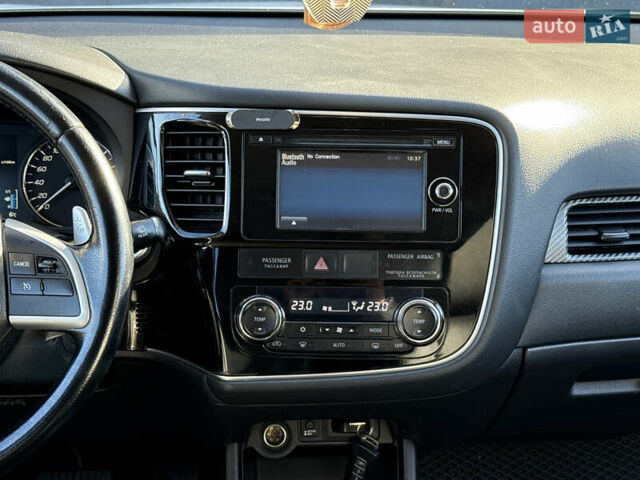 Белый Мицубиси Аутлендер, объемом двигателя 2.4 л и пробегом 148 тыс. км за 12900 $, фото 23 на Automoto.ua