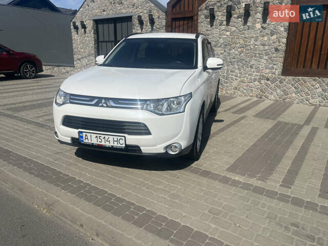 Білий Міцубісі Аутлендер, об'ємом двигуна 2 л та пробігом 127 тис. км за 14000 $, фото 1 на Automoto.ua