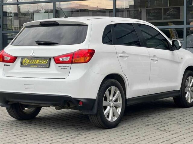Білий Міцубісі Аутлендер, об'ємом двигуна 2 л та пробігом 224 тис. км за 9900 $, фото 6 на Automoto.ua
