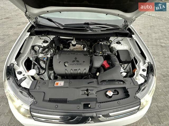 Белый Мицубиси Аутлендер, объемом двигателя 2.4 л и пробегом 175 тыс. км за 13900 $, фото 39 на Automoto.ua