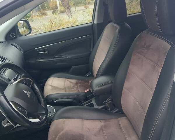 Белый Мицубиси Аутлендер, объемом двигателя 2 л и пробегом 203 тыс. км за 10750 $, фото 2 на Automoto.ua