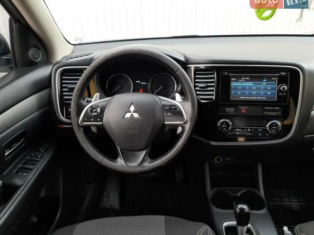 Білий Міцубісі Аутлендер, об'ємом двигуна 2 л та пробігом 245 тис. км за 12399 $, фото 5 на Automoto.ua