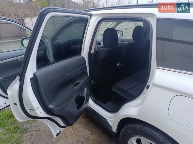 Белый Мицубиси Аутлендер, объемом двигателя 2.2 л и пробегом 278 тыс. км за 12600 $, фото 23 на Automoto.ua