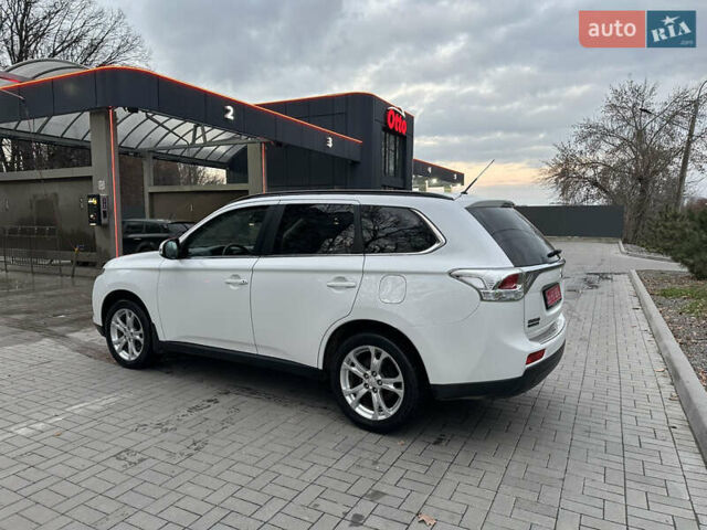 Белый Мицубиси Аутлендер, объемом двигателя 2.2 л и пробегом 225 тыс. км за 11999 $, фото 8 на Automoto.ua