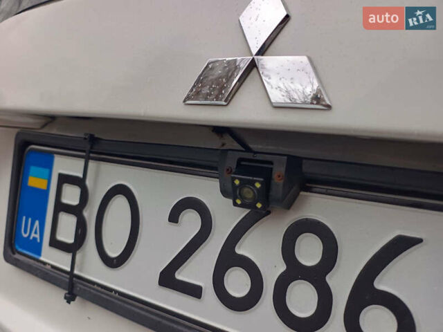 Белый Мицубиси Аутлендер, объемом двигателя 2.36 л и пробегом 250 тыс. км за 11200 $, фото 13 на Automoto.ua