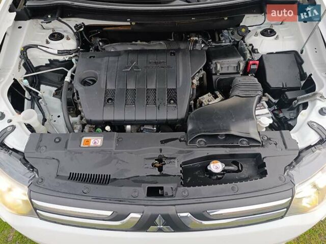 Белый Мицубиси Аутлендер, объемом двигателя 2.2 л и пробегом 278 тыс. км за 12600 $, фото 49 на Automoto.ua