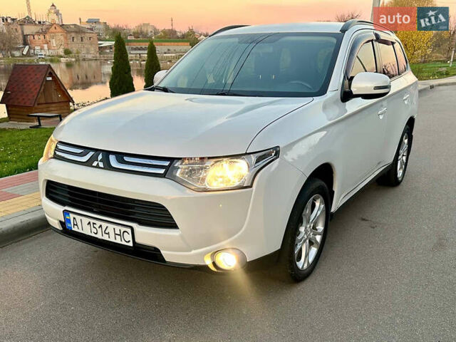 Белый Мицубиси Аутлендер, объемом двигателя 2 л и пробегом 127 тыс. км за 13200 $, фото 16 на Automoto.ua