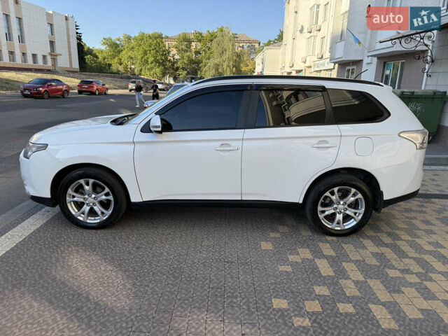 Білий Міцубісі Аутлендер, об'ємом двигуна 2.36 л та пробігом 146 тис. км за 14300 $, фото 6 на Automoto.ua