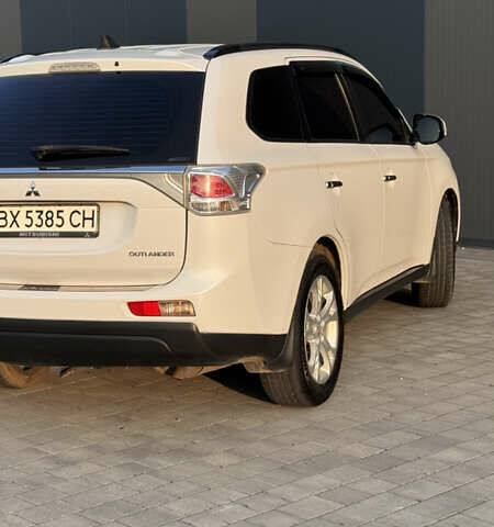 Білий Міцубісі Аутлендер, об'ємом двигуна 2.4 л та пробігом 240 тис. км за 12000 $, фото 3 на Automoto.ua