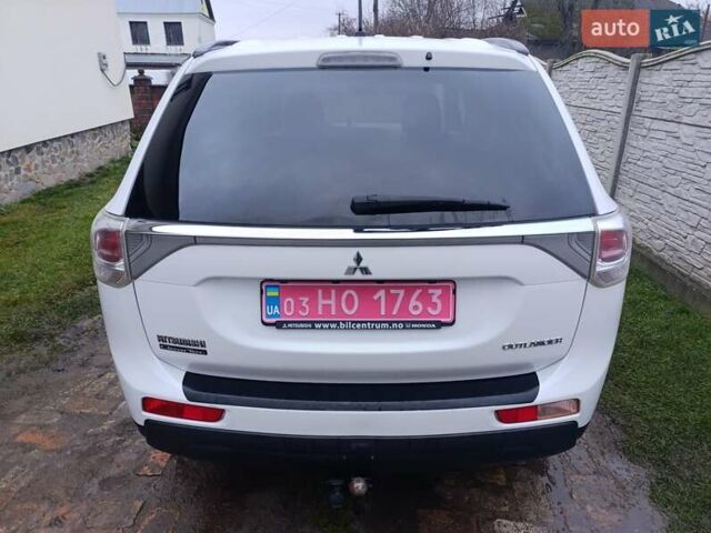 Белый Мицубиси Аутлендер, объемом двигателя 2.2 л и пробегом 278 тыс. км за 12600 $, фото 6 на Automoto.ua