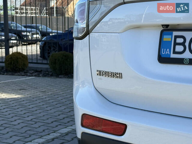 Белый Мицубиси Аутлендер, объемом двигателя 2.4 л и пробегом 148 тыс. км за 12900 $, фото 11 на Automoto.ua